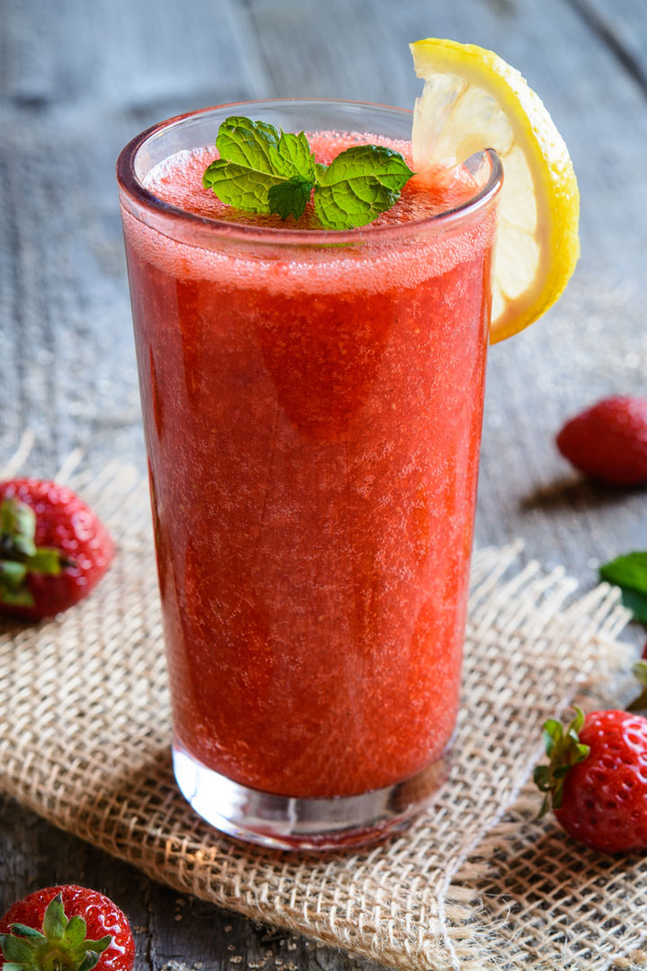 Refreshing Strawberry Smoothie With Lemon Juice In A Glass Jar